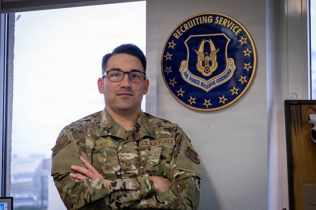 A U.S. military member crosses his arms.