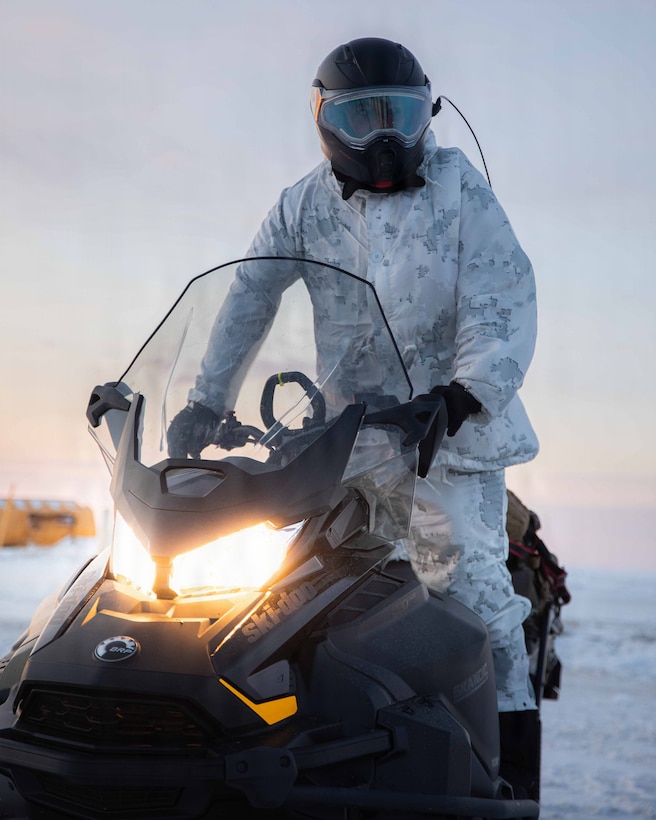 U.S. Marine Corps Sgt. Nicholas Baumbach, poses for a portrait in Kotzebue, Alaska, Dec. 06, 2025. Baumbach is an armorer and California native with Detachment Delta Company, 4th Law Enforcement Battalion, Force Headquarters Group. The Toys for Tots program highlights the Marine Corps' commitment to community support in the Arctic, while also enhancing the Marines’ preparedness for cold-weather operations. (U.S. Marine Corps photo by Cpl. Orion Stpierre)