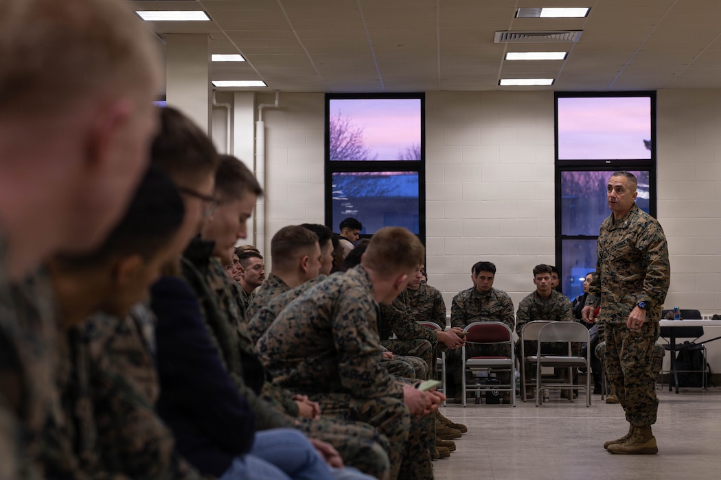 U.S. Marine Corps Col. James Fleming briefs Marines during the Yellow Ribbon Event at Fort Devens, Massachusetts, Dec. 13, 2025. Flemming is the commanding officer of the 25th Marine Regiment. The event provided resources, workshops and community-building opportunities to strengthen the resilience and readiness of military members and families before, during and after deployment. (U.S. Marine Corps photo by Lance Cpl. Priscilla Flores)