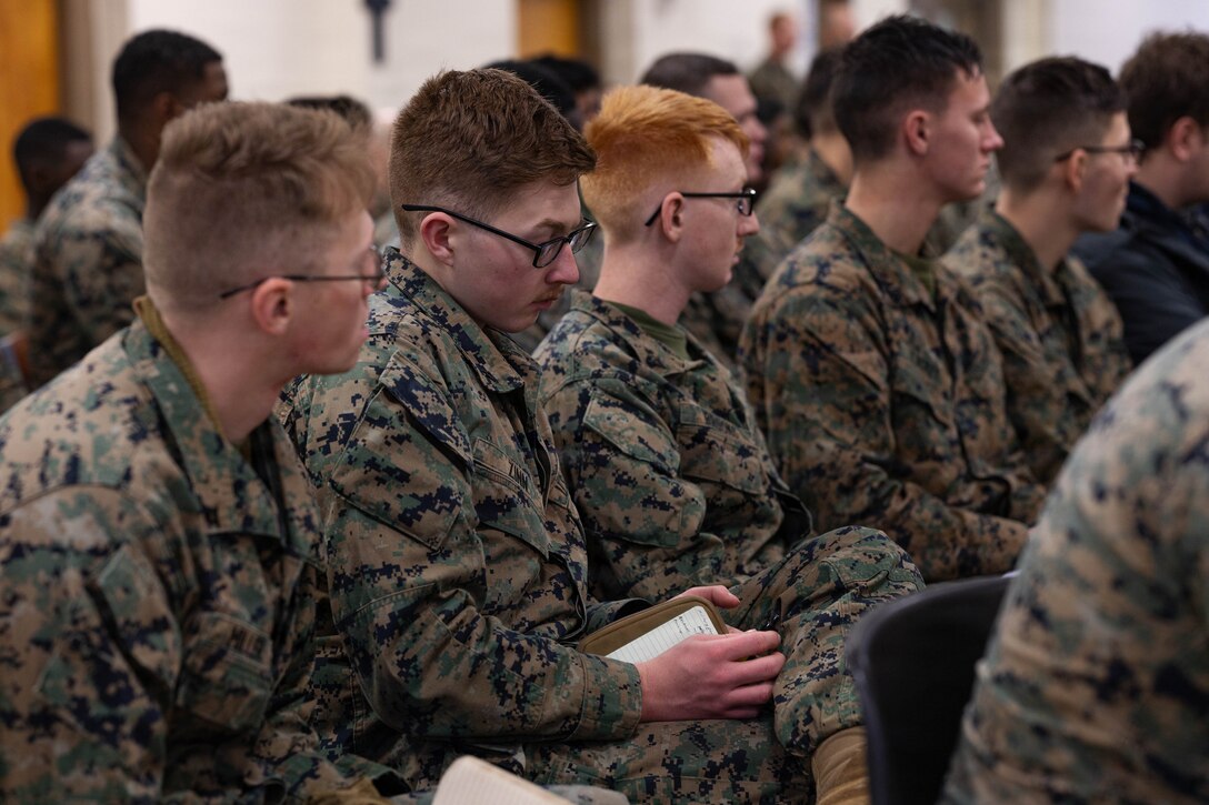 U.S. Marines with 25th Marine Regiment and their families gather for the Yellow Ribbon Event at Fort Devens, Massachusetts, Dec. 13, 2025. The event provided resources, workshops and community-building opportunities to strengthen the resilience and readiness of military members and families before, during and after deployment. (U.S. Marine Corps photo by Lance Cpl. Priscilla Flores)