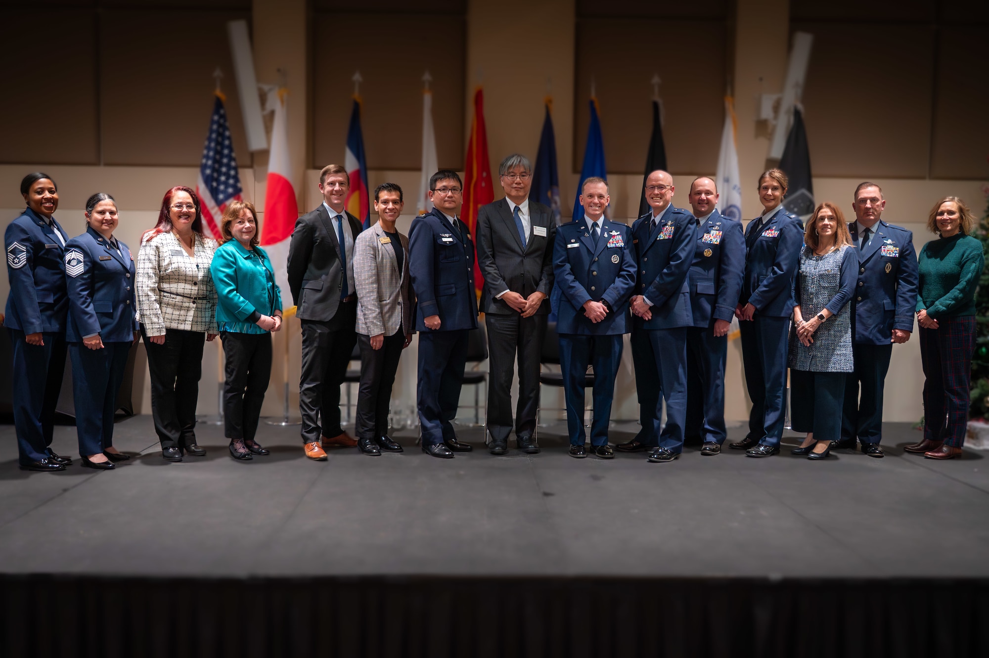people pose for a group photo