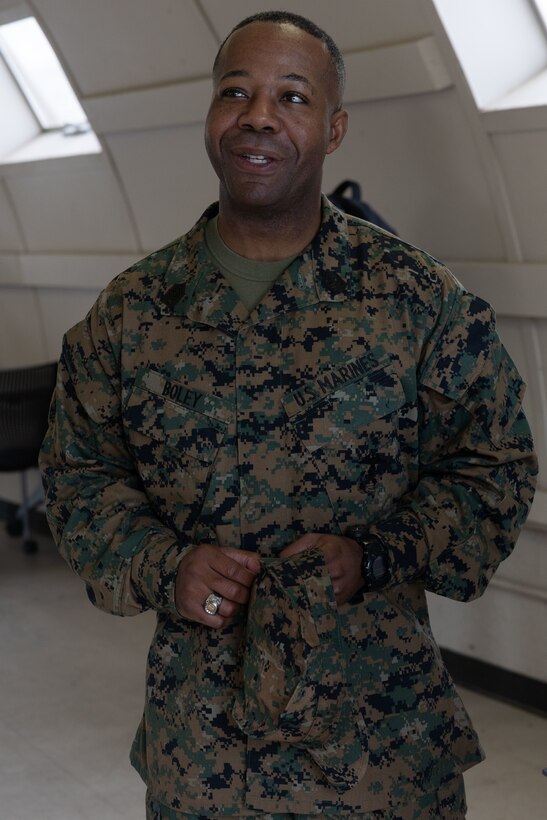 Sgt. Maj. Russell Boley speaks with Marines in the Individual Ready Reserve (IRR) during an IRR Muster at Camp Pendleton, California, Dec. 14, 2025. Boley is the command senior enlisted leader of Force Headquarters Group, Marine Forces Reserve. During these muster events, Marine Corps Individual Reserve Support Activity (MCIRSA) conducts an administrative screening of IRR Marines to ensure their readiness to augment and reinforce the active component. (U.S. Marine Corps photo by Sgt. Emily De La Torre)