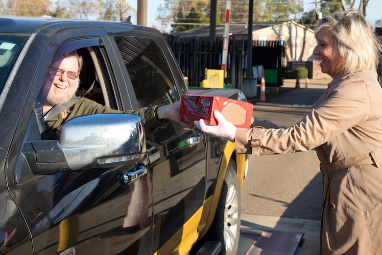 Employees greeted their coworkers and collected canned goods as they arrived at the ERDC gates — an effort that brought in 2,500 pounds of food.