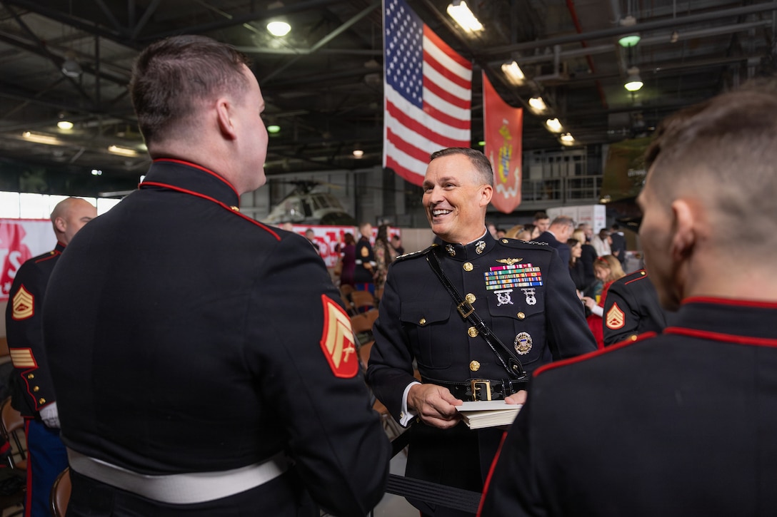 U.S. Marine Corps Lt. Gen. Leonard F. Anderson IV, center, commander, Marine Forces Reserve and Marine Forces South, talks to Marines during a Toys for Tots charity event on Marine Corps Base Quantico, Virginia, Dec. 8, 2025. Since 1947, the Marine Corps Reserve has spearheaded the Toys for Tots program nationwide to collect toys for less fortunate children during the holiday season. Presently, the program distributes 7 to 18 million toys to children annually. (U.S. Marine Corps photo by Lance Cpl. Van Hoang)