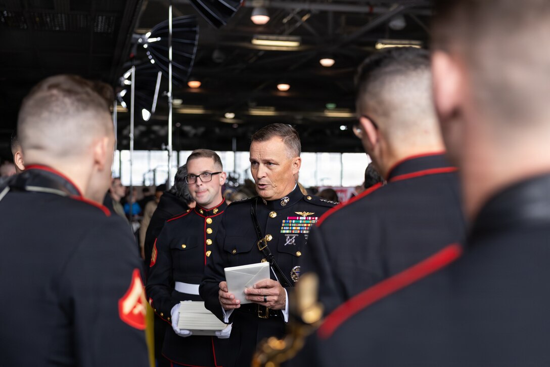 U.S. Marine Corps Lt. Gen. Leonard F. Anderson IV, center, commander, Marine Forces Reserve and Marine Forces South, talks to Marines during a Toys for Tots charity event on Marine Corps Base Quantico, Virginia, Dec. 8, 2025. Since 1947, the Marine Corps Reserve has spearheaded the Toys for Tots program nationwide to collect toys for less fortunate children during the holiday season. Presently, the program distributes 7 to 18 million toys to children annually. (U.S. Marine Corps photo by Lance Cpl. Van Hoang)