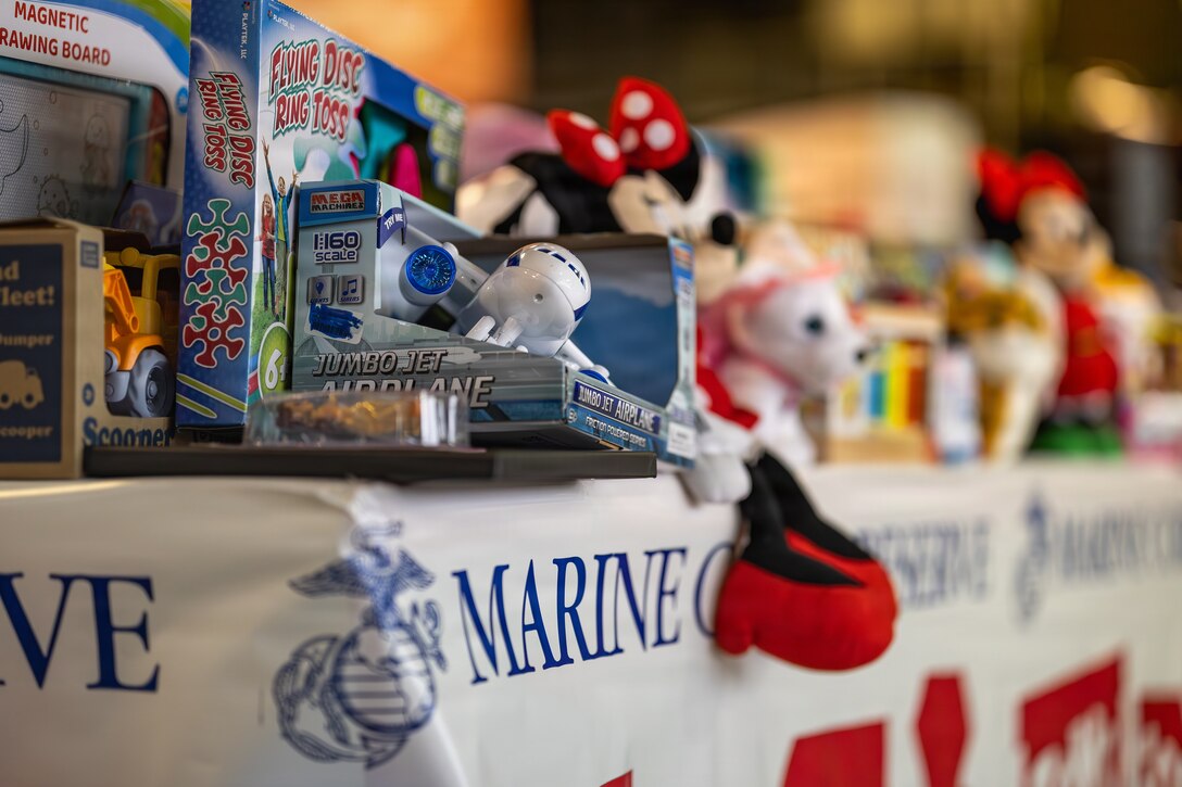 A collection of toys sit on a table during a Toys for Tots charity event on Marine Corps Base Quantico, Virginia, Dec. 8, 2025. Since 1947, the Marine Corps Reserve has spearheaded the Toys for Tots program nationwide to collect toys for less fortunate children during the holiday season. Presently, the program distributes 7 to 18 million toys to children annually. (U.S. Marine Corps photo by Lance Cpl. Van Hoang)