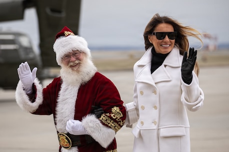 First lady of the United States, Melania Trump, right, and Santa Claus arrive to a Toys for Tots charity event on Marine Corps Base Quantico, Virginia, Dec. 8, 2025. Since 1947, the Marine Corps Reserve has spearheaded the Toys for Tots program nationwide to collect toys for less fortunate children during the holiday season. Presently, the program distributes 7 to 18 million toys to children annually. (U.S. Marine Corps photo by Lance Cpl. Van Hoang)