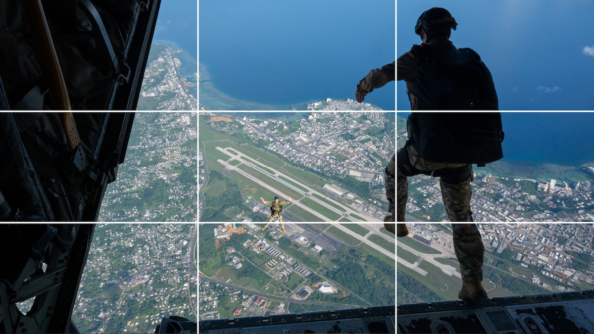 Two uniformed service members jump out of a military aircraft midair during a training exercise on a sunny day. The rule of thirds grid is overlaid on the photo.
