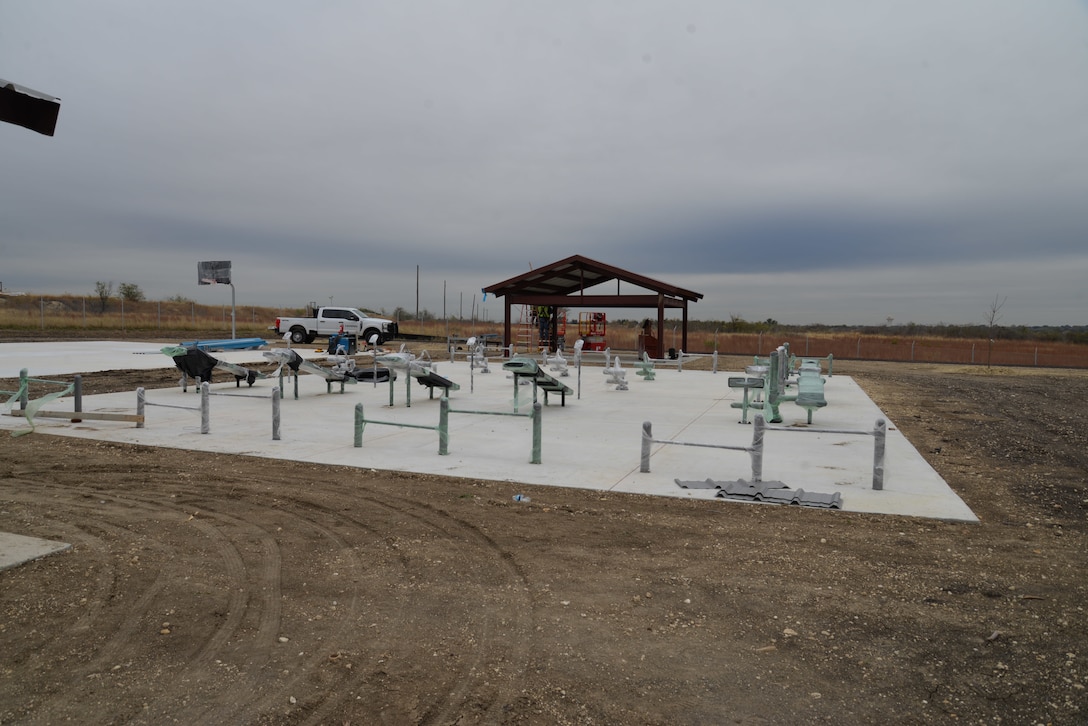 Fort Worth District’s Central Texas Area Office worked with contractors on Fort Hood, Texas to construct an outdoor fitness area for soldiers assigned to the 69th Air Defense Artillery Brigade. The facility contains a basketball court, free weights with barbells and benches, a covered shelter, and a running track. Soldiers will be able to conduct physical fitness training in a confined area reducing the need to use surface roads for runs.