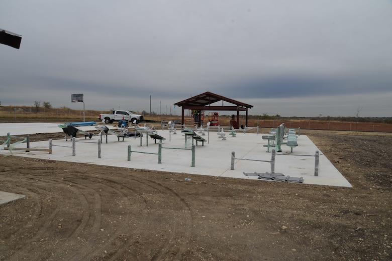 Fort Worth District’s Central Texas Area Office worked with contractors on Fort Hood, Texas to construct an outdoor fitness area for soldiers assigned to the 69th Air Defense Artillery Brigade. The facility contains a basketball court, free weights with barbells and benches, a covered shelter, and a running track. Soldiers will be able to conduct physical fitness training in a confined area reducing the need to use surface roads for runs.