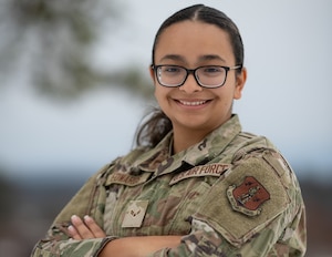 Outside Portrait of A1C Edwards, a paralegal assigned to the 158th Fighter Wing, tells her story about attending college while serving as a drill status Guardsmen