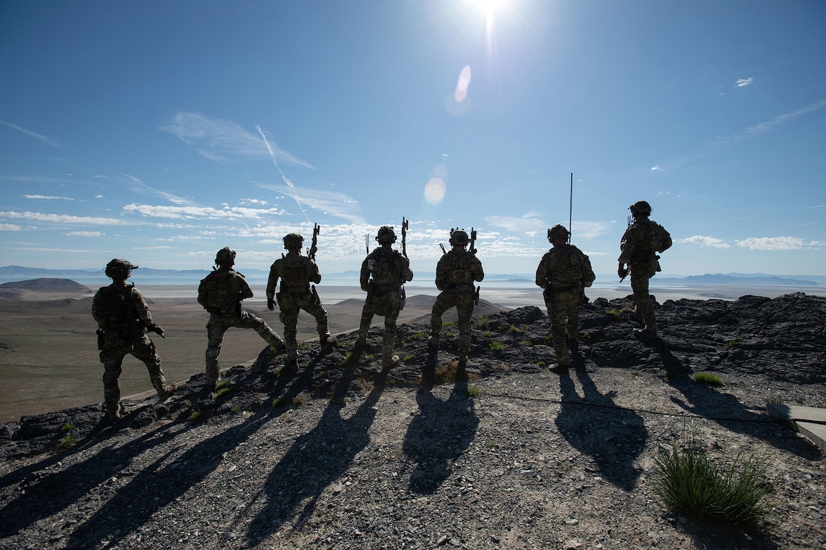 Soldiers assigned to the 19th Special Forces Group (Airborne), Utah National Guard, look over the area of operations during Exercise Hydra at the Utah Test and Training Range, May 8, 2025. The exercise serves to prepare participants to respond decisively to complex threats across all domains. (Photo by U.S. Air Force Master Sgt. Danny Whitlock)
