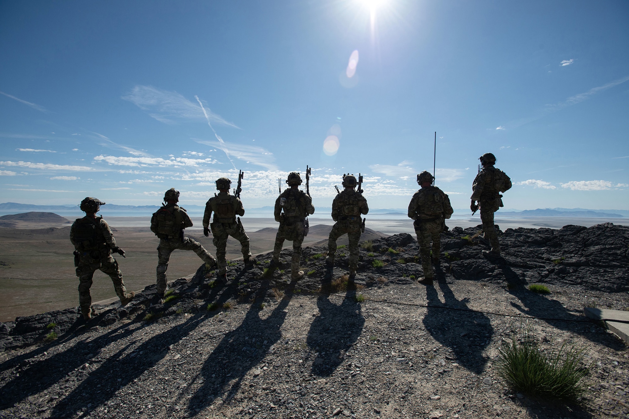 Soldiers assigned to the 19th Special Forces Group (Airborne), Utah National Guard, look over the area of operations during Exercise Hydra at the Utah Test and Training Range, May 8, 2025. The exercise serves to prepare participants to respond decisively to complex threats across all domains. (Photo by U.S. Air Force Master Sgt. Danny Whitlock)