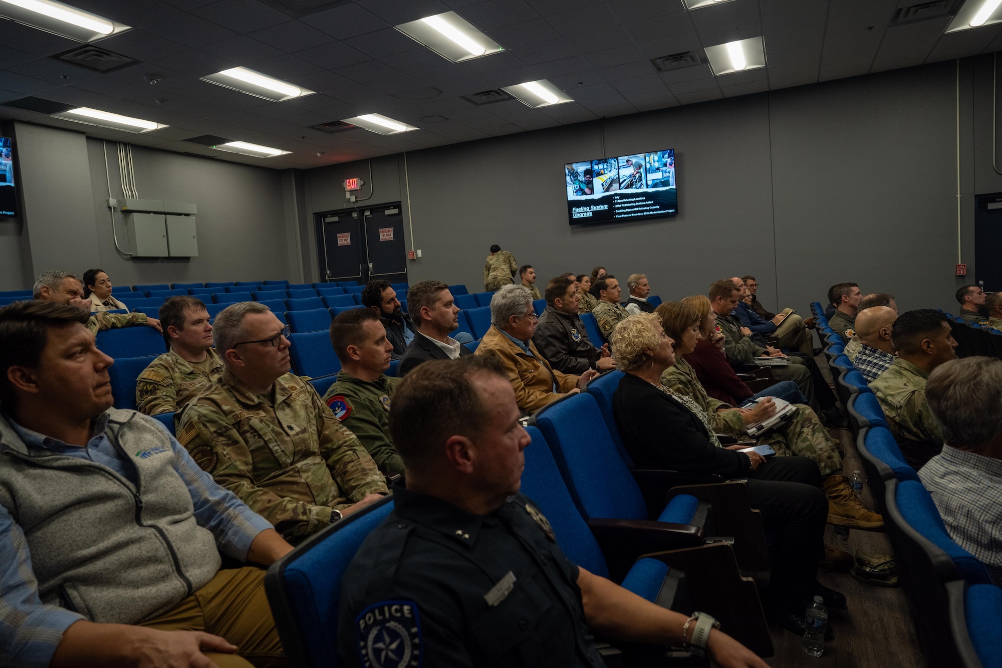 Dyess Air Force Base commanders and honorary commanders attend a townhall at Dyess Air Force Base, Texas, Dec. 17, 2025. Honorary commanders serve as liaisons between Dyess and the Abilene community, helping strengthen relationships and mutual understanding through shared engagement. (U.S. Air Force photo by Airman 1st Class Adrien Tran)