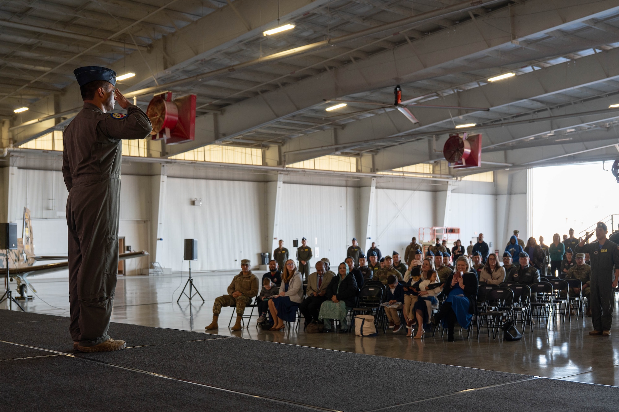 Commander renders final salute to formation.