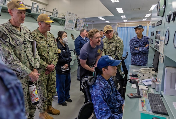 TAURA, Japan (Nov. 18, 2025) — Personnel from Commander, Submarine Group Seven; U.S. Naval Hospital Yokosuka; Japan Self-Defense Force Hospital Yokosuka; Japan Maritime Self-Defense Force Undersea Medical Center; and the Navy Dive Locker at U.S. Naval Ship Repair Facility and Japan Regional Maintenance Center observe hyperbaric chamber operations during a bilateral emergency medical drill. The exercise rehearsed coordinated response, transport, and evaluation procedures for a simulated diving-related embolism. (U.S. Navy photo by Daniel Taylor/USNMRTC Yokosuka Public Affairs)