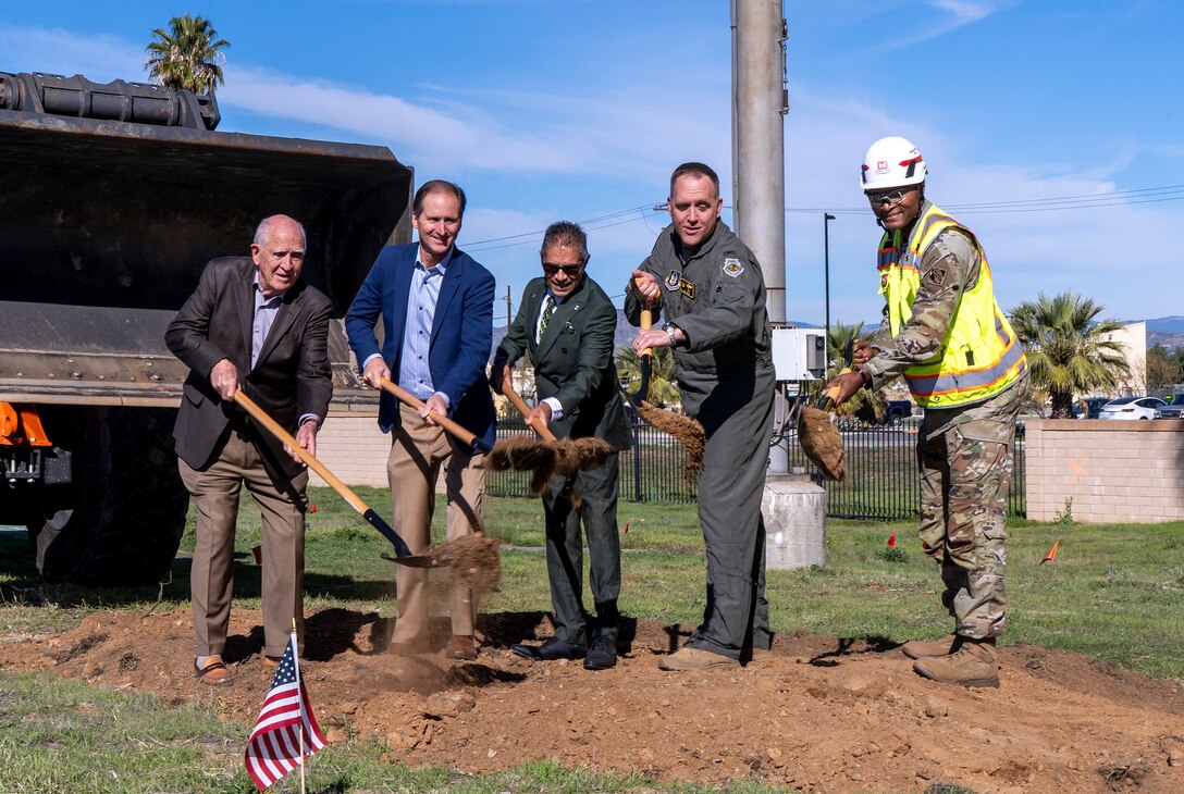 Lt. Col. Stephen Brooks, deputy commander of the U.S. Army Corps of Engineers Los Angeles District, right, participates in a ceremonial shovel turn during a groundbreaking ceremony Dec. 16 for a new KC-46 Pegasus hangar and training facility at March Air Reserve Base in Riverside County, California. The $133 million project will modernize maintenance and training infrastructure in support of the 452nd Air Mobility Wing. Second from right is Col. Bryan Bailey, commander of the 452nd Air Mobility Wing.