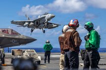 An F/A-18F Super Hornet, attached to Strike Fighter Squadron (VFA) 41, prepares to make an arrested landing on the flight deck of Nimitz-class aircraft carrier USS Abraham Lincoln (CVN 72) on Dec. 16, 2025.