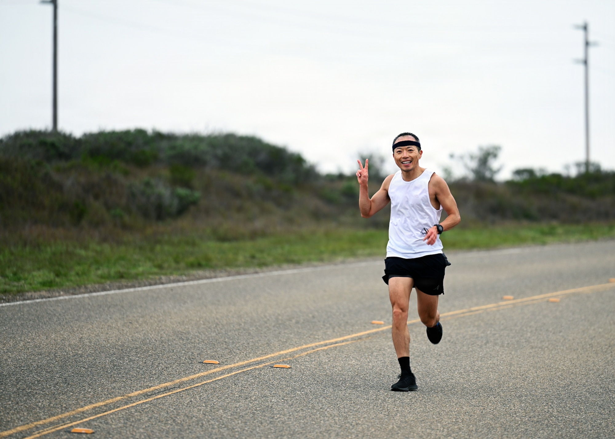 U.S. Space Force Sgt. Guoming Li, Space Delta 5 operations and planning noncommissioned officer, runs along the course during the localized T-Minus 10-Miler at Vandenberg Space Force Base