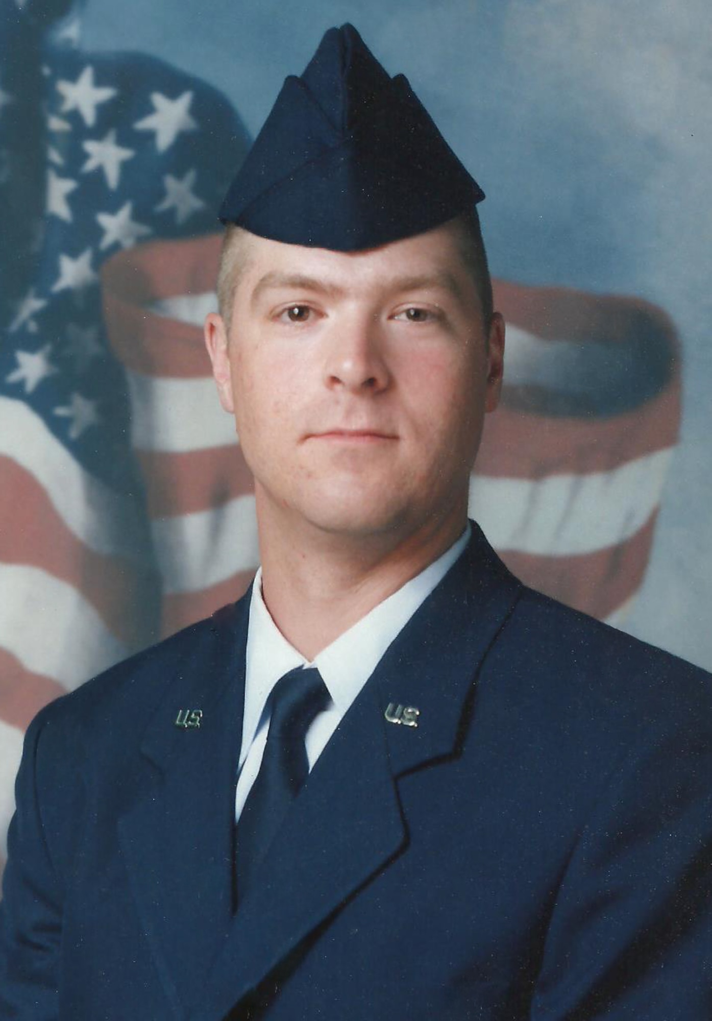 An official portrait of U.S. Air Force Chief Master Sgt. Edward Mueller, 673rd Logistics Readiness Group senior enlisted leader, as an Airman Basic in basic military training. (Courtesy photo)
