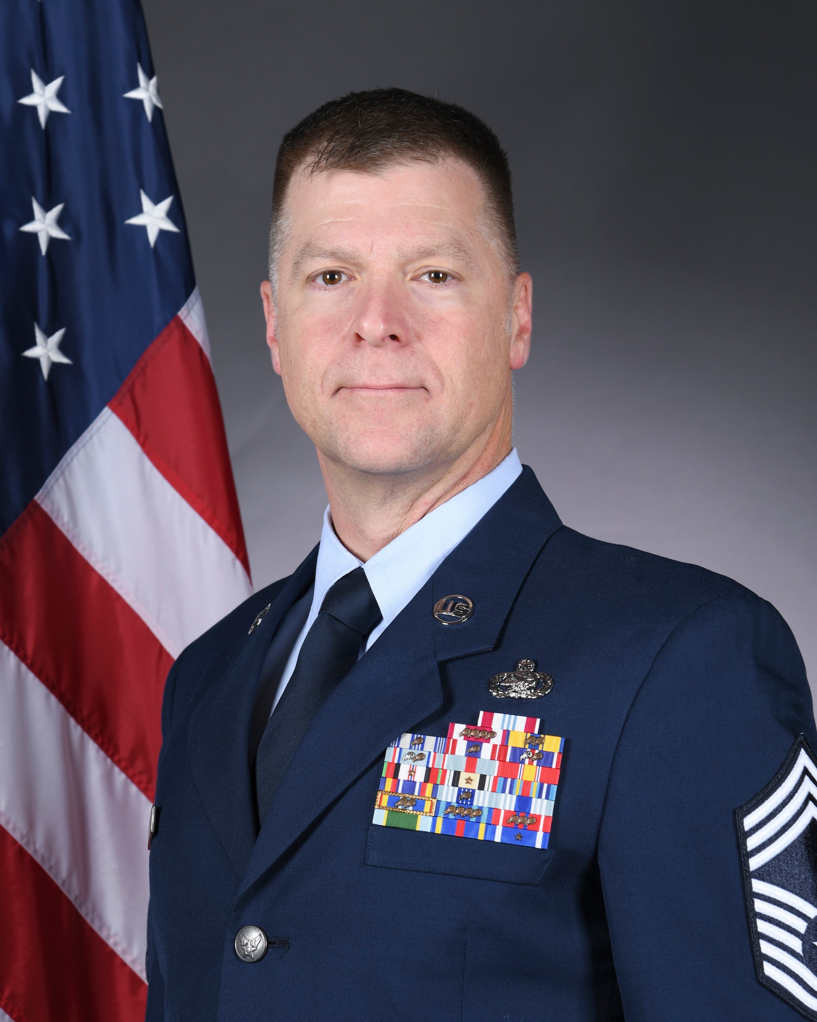 U.S. Air Force Chief Master Sgt. Edward Mueller, 673rd Logistics Readiness Group senior enlisted leader, poses for an official portrait at Joint Base Elmendorf-Richardson, Alaska, Nov. 8, 2025. (Courtesy photo)