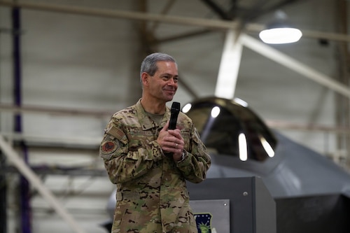 Air Force Chief of Staff Gen. Ken Wilsbach addresses a crowd of 48th Fighter Wing Airmen during a visit to RAF Lakenheath, England, Dec. 19, 2025.