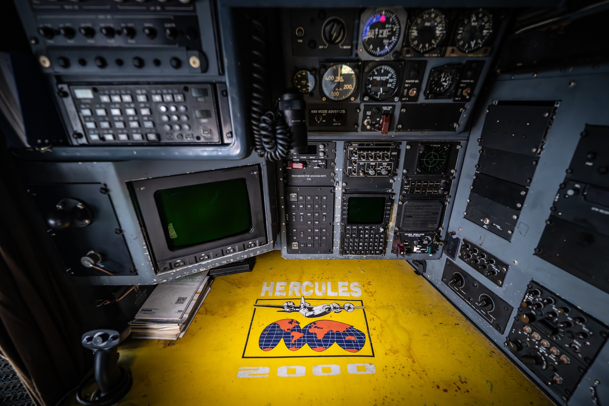 The navigator’s station on the flight deck of a historic C-130 Hercules aircraft, nicknamed Man o’ War in honor of the famous thoroughbred racehorse, features a unique logo indicating the aircraft’s status as the 2000th Hercules ever to roll off the assembly line at Lockheed-Martin. The plane, which began its career in 1992 with the Kentucky Air National Guard’s 123rd Airlift Wing, is now being retired for static display at the unit’s base in Louisville — home of the Kentucky Derby. (U.S. Air National Guard photo by Dale Greer)
