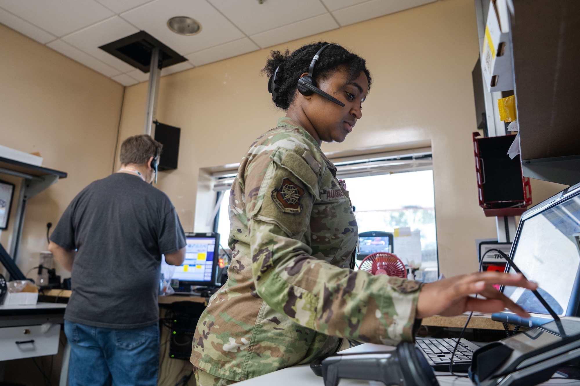 Pharmacy technicians assigned to the 6th Medical Support Squadron assist customers at MacDill Air Force Base, Florida, Oct. 20, 2025. The 6th MDSS pharmacy employs a wide range of staff including active duty service members, contractors, government civilians and local students. (U.S. Air Force photo by Senior Airman Zachary Foster)