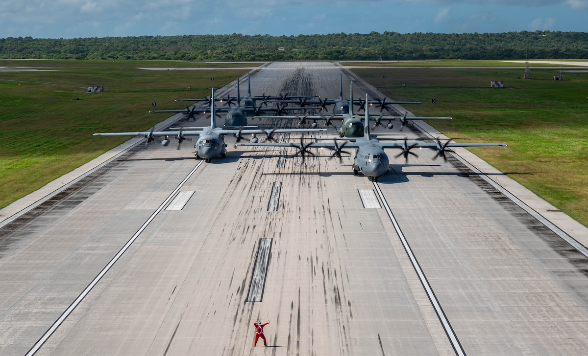 A formation of C-130J Super Hercules and C-130H Hercules aircraft from the U.S. Air Force, Japan Air Self-Defense Force and Republic of Korea Air Force taxi.