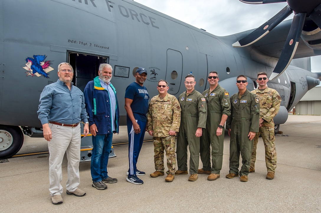 Retired 123rd Airlift Wing aircrew, left, and current Delaware Air National Guard aircrew pose in front of a C-130H Hercules that’s being retired for static display at the Kentucky Air National Guard Base in Louisville, Ky., Sept. 22, 2025. The aircraft, originally named Man o’ War for the famous thoroughbred race horse and first assigned to the 123rd straight from Lockheed-Martin in 1992, was later transferred to the Delaware Air Guard. The retirees — from left to right, Master Sgt. Jeff Bishop, Col. David Moreman and Chief Master Sgt. Joe Dawson — were part of the original crew that flew the plane to Louisville on its maiden flight from the factory. (U.S. Air National Guard photo by Phil Speck)