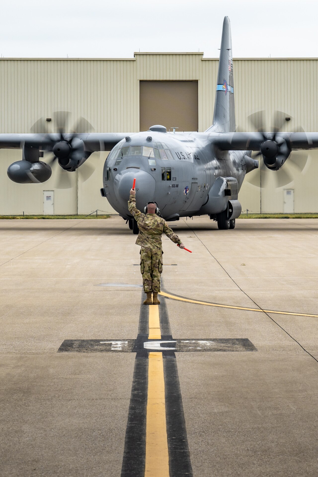 A historic C-130H Hercules taxies onto the flight line at the Kentucky Air National Guard Base in Louisville, Ky., Sept. 22, 2025, ending the 33-year-old transport’s final flight. The plane, which has flown millions of miles around the world over the past three decades, initially was assigned to the Kentucky Air Guard’s 123rd Airlift Wing straight from the Lockheed-Martin factory in 1992 before being reassigned to the Delaware Air Guard in 2021, when the Louisville unit began transitioning to the new C-130J Super Hercules. Named after the famous thoroughbred racehorse “Man o’ War” during its time in Kentucky, tail number 1231 was the 2000th C-130 to roll off the assembly line. It will now be placed on static display for retirement at its original Kentucky home, complete with restored livery and its unique Man o’ War markings. (U.S. Air National Guard photo by Dale Greer)
