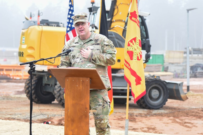 man speaking from podium