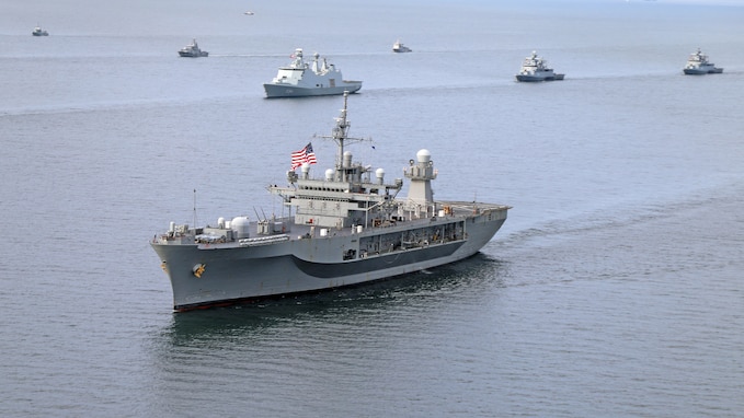 The command ship USS Mount Whitney sails in formation with other U.S. and NATO warships in the Baltic Sea.