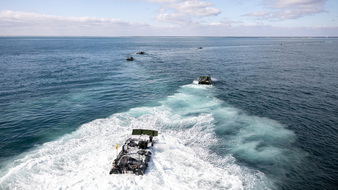 U.S. Marines with Alpha Company, 2nd Assault Amphibian Battalion, 2nd Marine Division conduct ship-to-shore movements during Naval Integration Training Package 2 off the coast of North Carolina, Dec. 3, 2025. NITP-2 is an amphibious, ship-to-shore, part of a larger training evolution certifying amphibious combat vehicle crewmen to safely and properly conduct combat operations with the ACV. (U.S. Marine Corps photo by Lance Cpl. Dominic Trujillo)