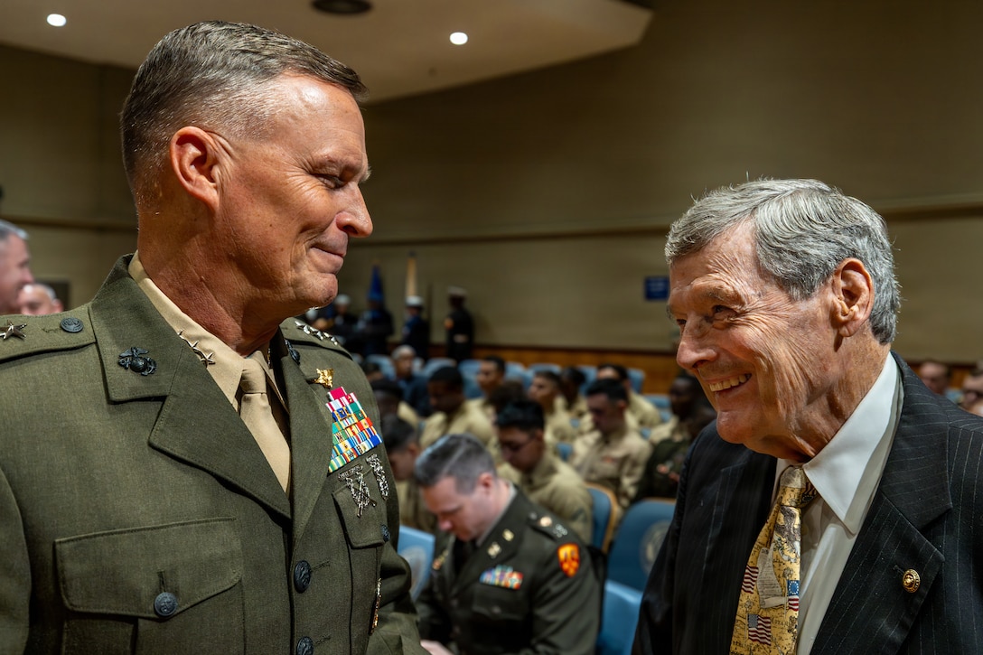 U.S. Marine Corps Lt. Gen. Leonard F. Anderson IV, commander of Marine Forces Reserve and Marine Forces South, converses with retired U.S. Marine Corps Col. Terry Ebbort before the military appreciation day at the New Orleans City Hall, New Orleans, Dec. 18, 2025. The event was held to honor the New Orleans City Council's relationship with U.S. military officials, highlighting key recognitions such as acknowledging Ebbort as Veteran of the Year, as well as major accomplishments from each military branch across the city and the council’s appreciation for the service of U.S. military members. (U.S. Marine Corps photo taken by Sgt. Aaron TorresLemus)
