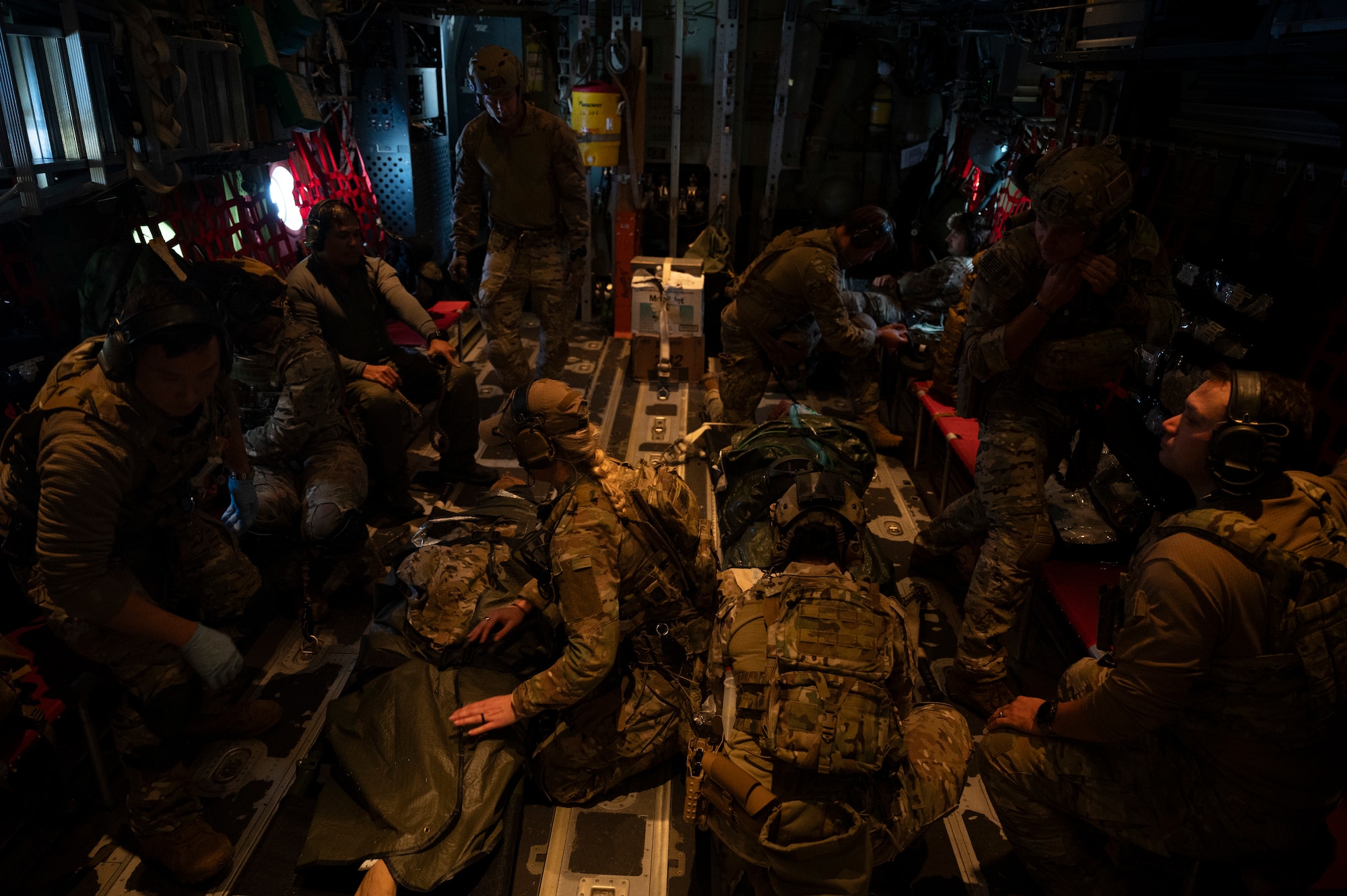 Air Commandos assigned to the 1st Special Operations Wing participate in casualty evacuation training aboard an MC-130J Commando II over Hurlburt Field, Florida, Nov. 4, 2025.