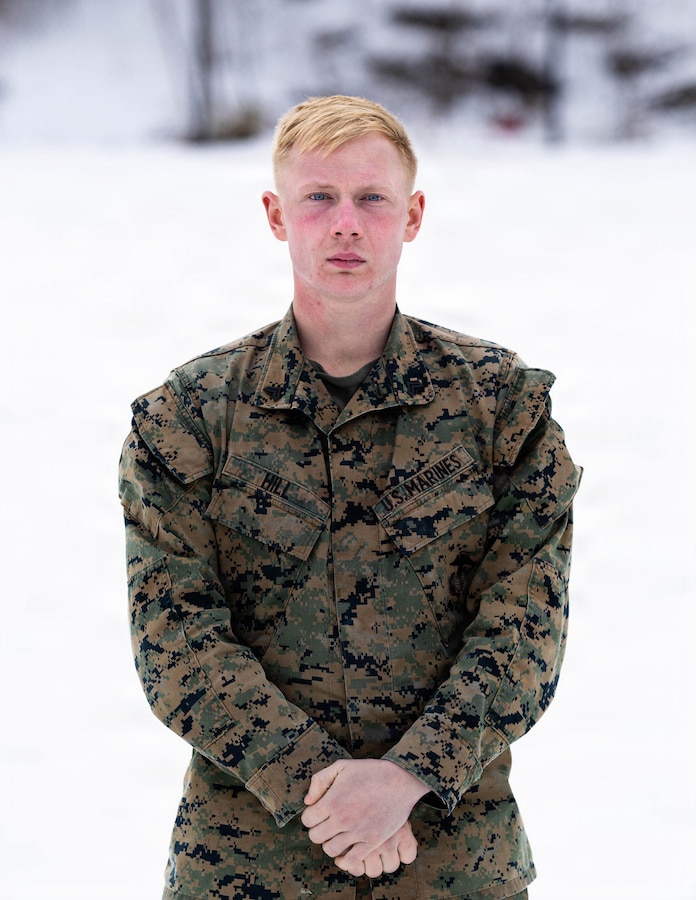 U.S. Marine Corps Cpl. Nathaniel Hill, a rifleman with Charlie Company, 1st Battalion, 25th Marine Regiment, poses for a portrait photo at Fort Devens, Massachusetts, Dec. 14, 2025. Hill provided Marine Forces Reserve Communication Strategy and Operations Marines with an interview to participate in a feature story. (U.S. Marine Corps photo by Lance Cpl. Priscilla Flores)