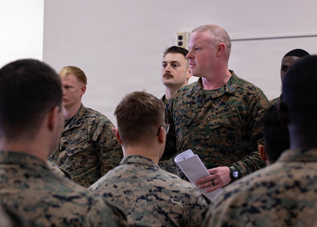 U.S. Marine Corps 1st Sgt. Kyle King gives advice to graduates of Lance Corporal Leadership and Ethics Seminar and Corporals Course at Fort Devens, Massachusetts, Dec. 14, 2025. King is the senior enlisted leader with Charlie Company, 1st Battalion, 25th Marine Regiment. These courses focused on leadership development, ethical decision-making and enhancing professional skills to prepare Marines for increased responsibilities. (U.S. Marine Corps photo by Lance Cpl. Priscilla Flores)