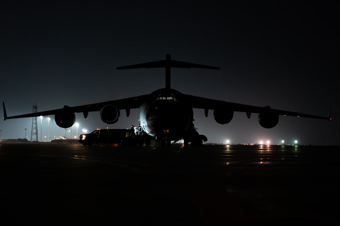 A U.S. Air Force C-17 Globemaster III aircraft assigned to the 16th Expeditionary Airlift Squadron sits on the flight line in an undisclosed location ­­­­­­before a mission in the U.S. Central Command area of responsibility, Nov. 24, 2025. The 16th EAS directly supports the CENTCOM mission through cargo operations across the AOR ensuring rapid mobility for personnel and equipment anytime of the day or night. (U.S. Air Force photo by Airman 1st Class Travis Knauss)