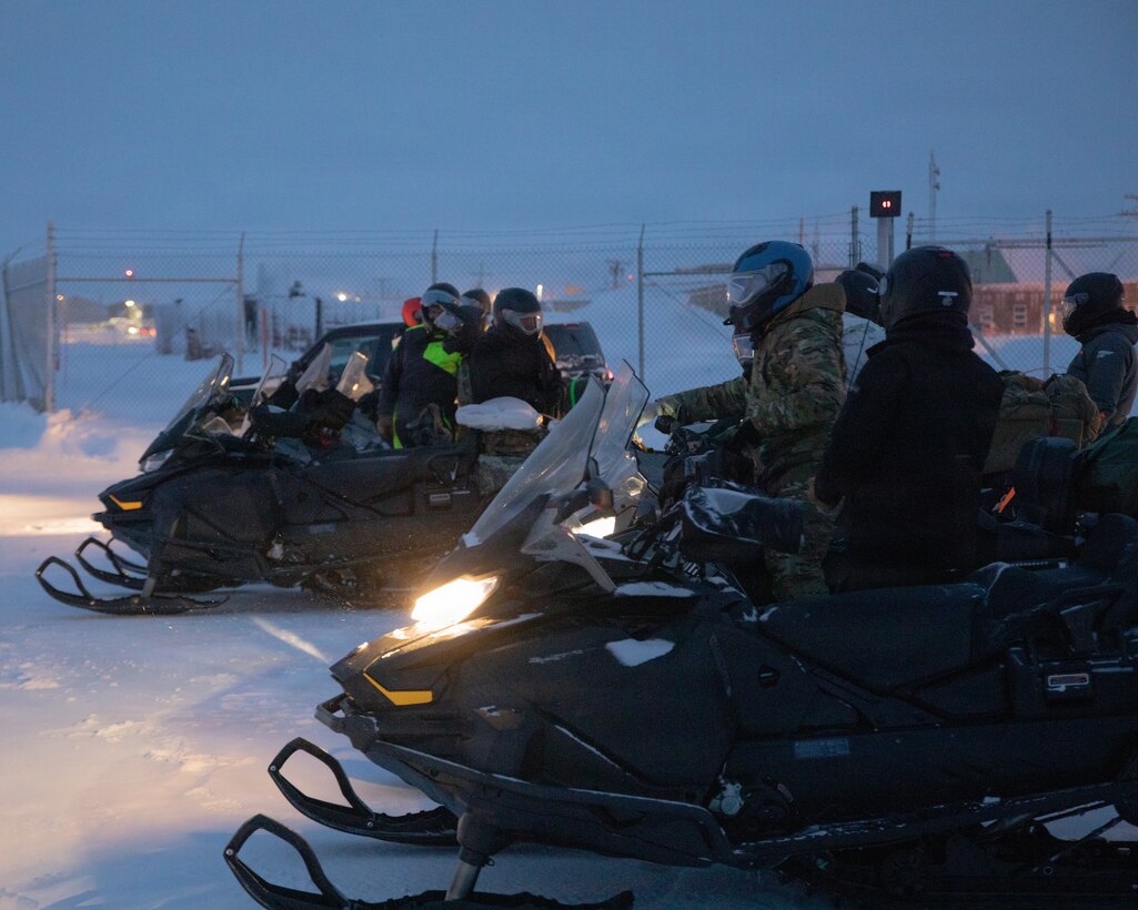 U.S. Marines and U.S. Airmen arrive in Anchorage, Alaska after completing their Toys for Tots mission, Dec. 16, 2025. The Marines, assigned to Detachment Delta Company, 4th Law Enforcement Battalion, Force Headquarters Group, and the Airmen, assigned to the 673rd Security Forces Squadron, are participating in Operation Polar Knight in support of the Toys for Tots mission reaching remote Alaskan communities. (U.S. Marine Corps photo by Cpl. Orion Stpierre)