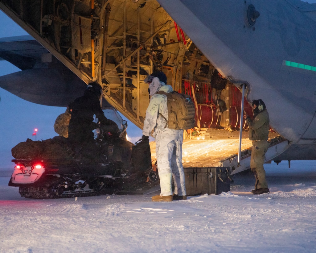 U.S. Marines and U.S. Airmen arrive in Anchorage, Alaska after completing their Toys for Tots mission, Dec. 16, 2025. The Marines, assigned to Detachment Delta Company, 4th Law Enforcement Battalion, Force Headquarters Group, and the Airmen, assigned to the 673rd Security Forces Squadron, are participating in Operation Polar Knight in support of the Toys for Tots mission reaching remote Alaskan communities. (U.S. Marine Corps photo by Cpl. Orion Stpierre)