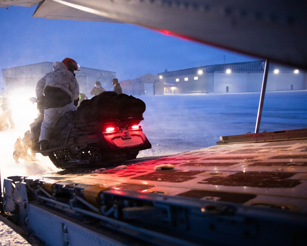 U.S. Marines and U.S. Airmen arrive in Anchorage, Alaska after completing their Toys for Tots mission, Dec. 16, 2025. The Marines, assigned to Detachment Delta Company, 4th Law Enforcement Battalion, Force Headquarters Group, and the Airmen, assigned to the 673rd Security Forces Squadron, are participating in Operation Polar Knight in support of the Toys for Tots mission reaching remote Alaskan communities. (U.S. Marine Corps photo by Cpl. Orion Stpierre)