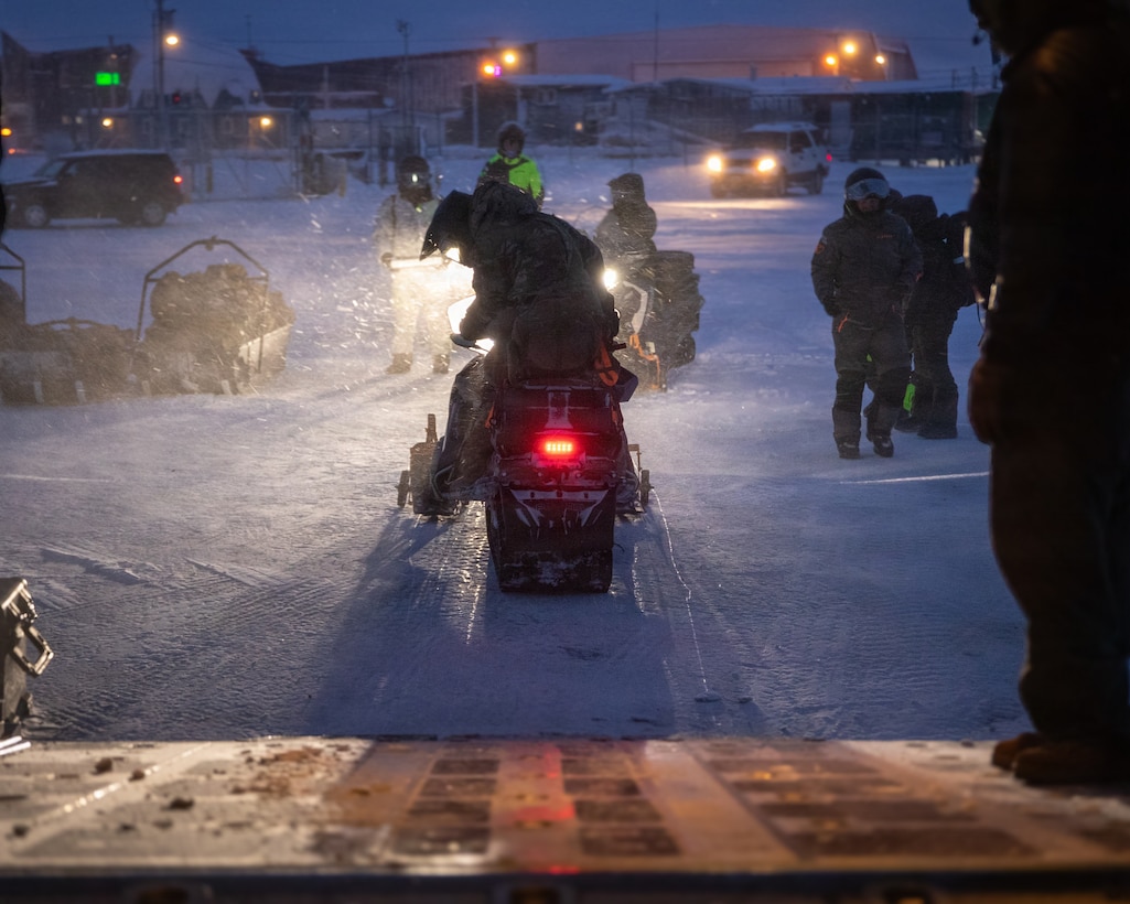 U.S. Marines and U.S. Airmen arrive in Anchorage, Alaska after completing their Toys for Tots mission, Dec. 16, 2025. The Marines, assigned to Detachment Delta Company, 4th Law Enforcement Battalion, Force Headquarters Group, and the Airmen, assigned to the 673rd Security Forces Squadron, are participating in Operation Polar Knight in support of the Toys for Tots mission reaching remote Alaskan communities. (U.S. Marine Corps photo by Cpl. Orion Stpierre)