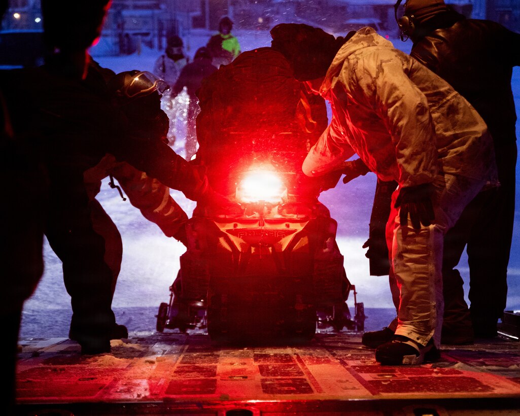U.S. Marines and U.S. Airmen arrive in Anchorage, Alaska after completing their Toys for Tots mission, Dec. 16, 2025. The Marines, assigned to Detachment Delta Company, 4th Law Enforcement Battalion, Force Headquarters Group, and the Airmen, assigned to the 673rd Security Forces Squadron, are participating in Operation Polar Knight in support of the Toys for Tots mission reaching remote Alaskan communities. (U.S. Marine Corps photo by Cpl. Orion Stpierre)