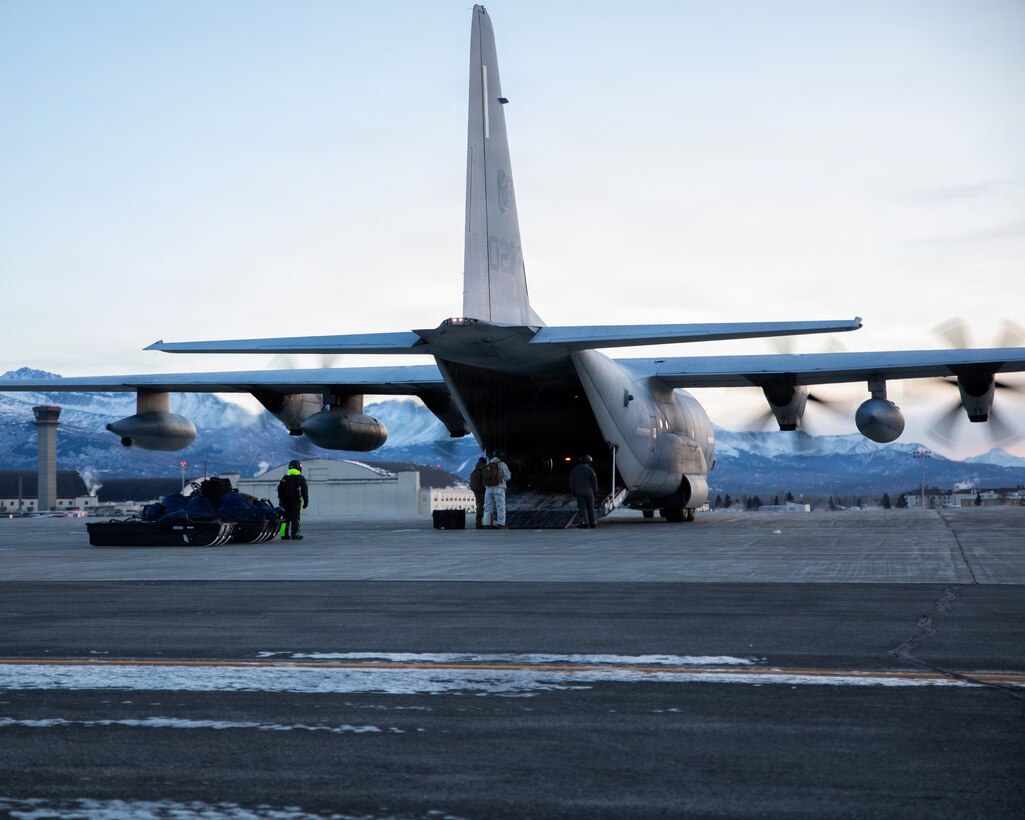 U.S. Marines and U.S. Airmen arrive in Anchorage, Alaska after completing their Toys for Tots mission, Dec. 16, 2025. The Marines, assigned to Detachment Delta Company, 4th Law Enforcement Battalion, Force Headquarters Group, and the Airmen, assigned to the 673rd Security Forces Squadron, are participating in Operation Polar Knight in support of the Toys for Tots mission reaching remote Alaskan communities. (U.S. Marine Corps photo by Cpl. Orion Stpierre)