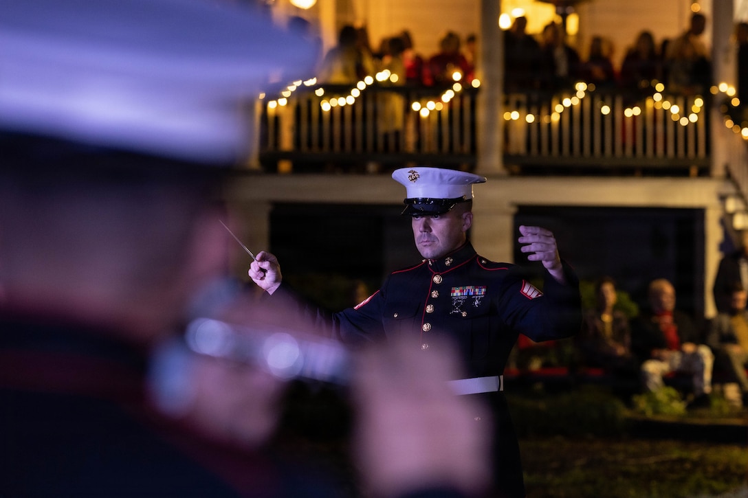 The Marine Forces Reserve band plays at the annual Christmas party held at Quarters A in New Orleans, Dec. 6, 2025. The event supported the Marine Corps Reserve Toys for Tots program, with guests contributing donations throughout the evening, and featured a concert by the Marine Forces Reserve Band as its main attraction. (U.S. Marine Corps photo by Lance Cpl. Priscilla Flores)