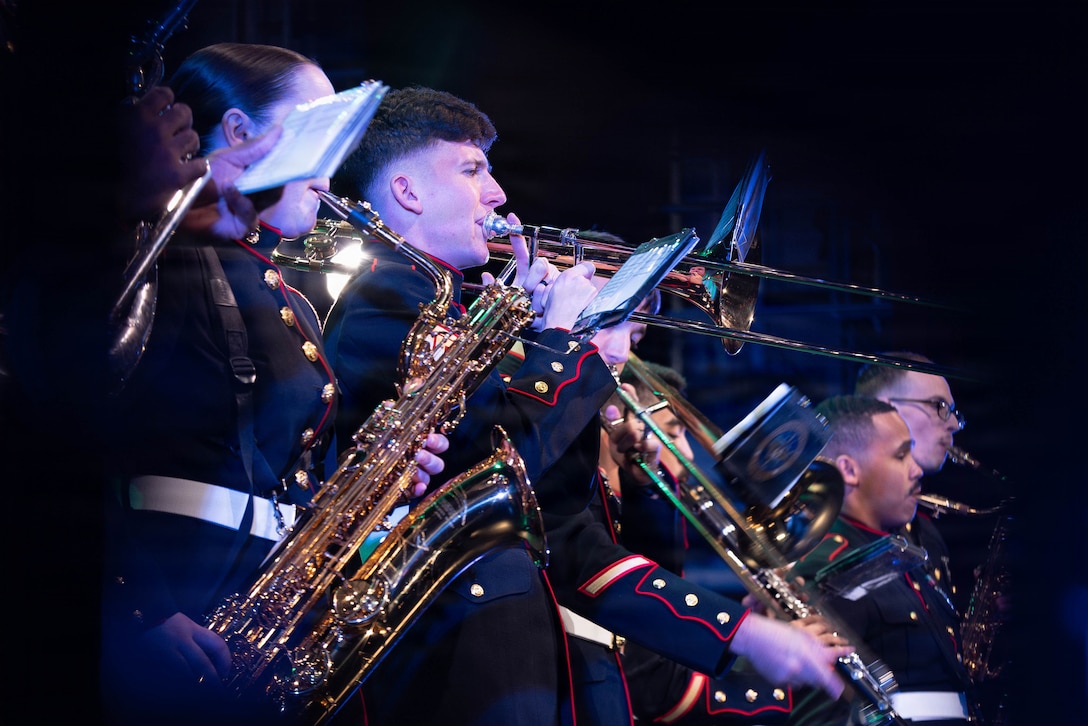 U.S. Marine Corps instrumentalists with the Marine Forces Reserve Band perform at the Morgan City Municipal Auditorium, Morgan City, Louisiana, Dec. 9, 2025. The Marine Forces Reserve Band performed for the local community to listen to holiday music in the areas surrounding New Orleans while supporting the collecting of new, unwrapped toys for Toys for Tots. (U.S. Marine Corps photo by Lance Cpl. Priscilla Flores)