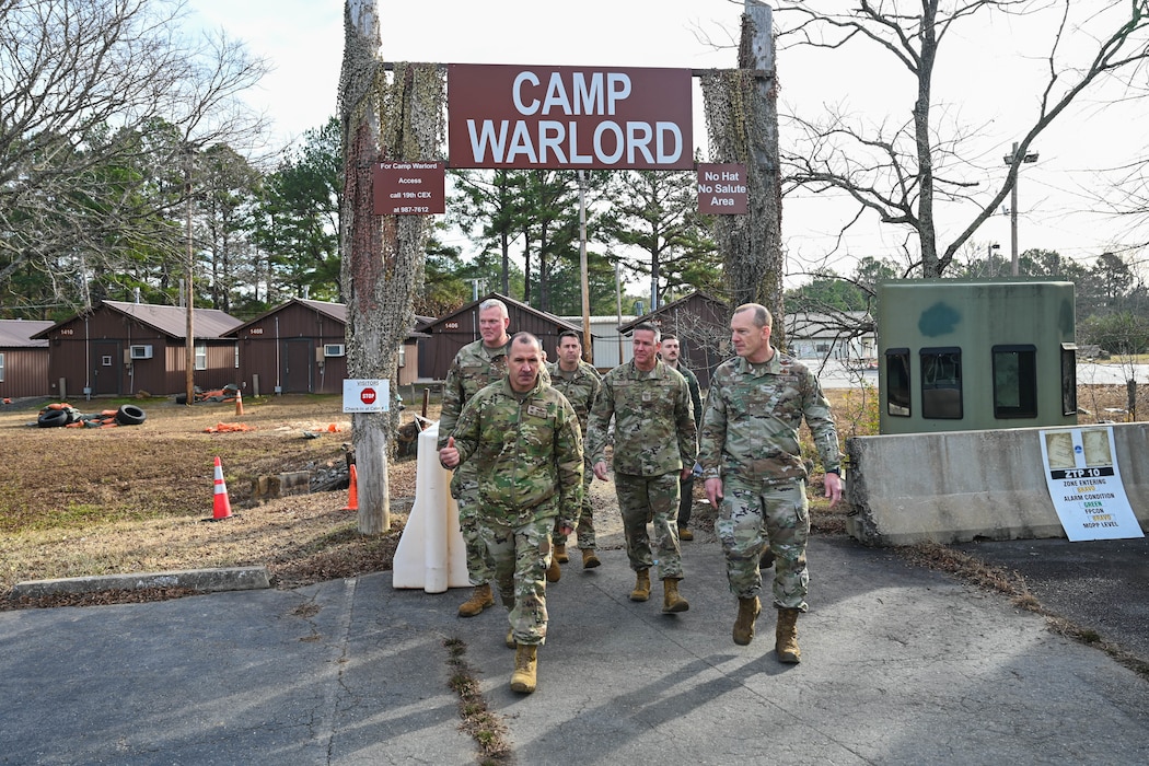A group of people depart together.