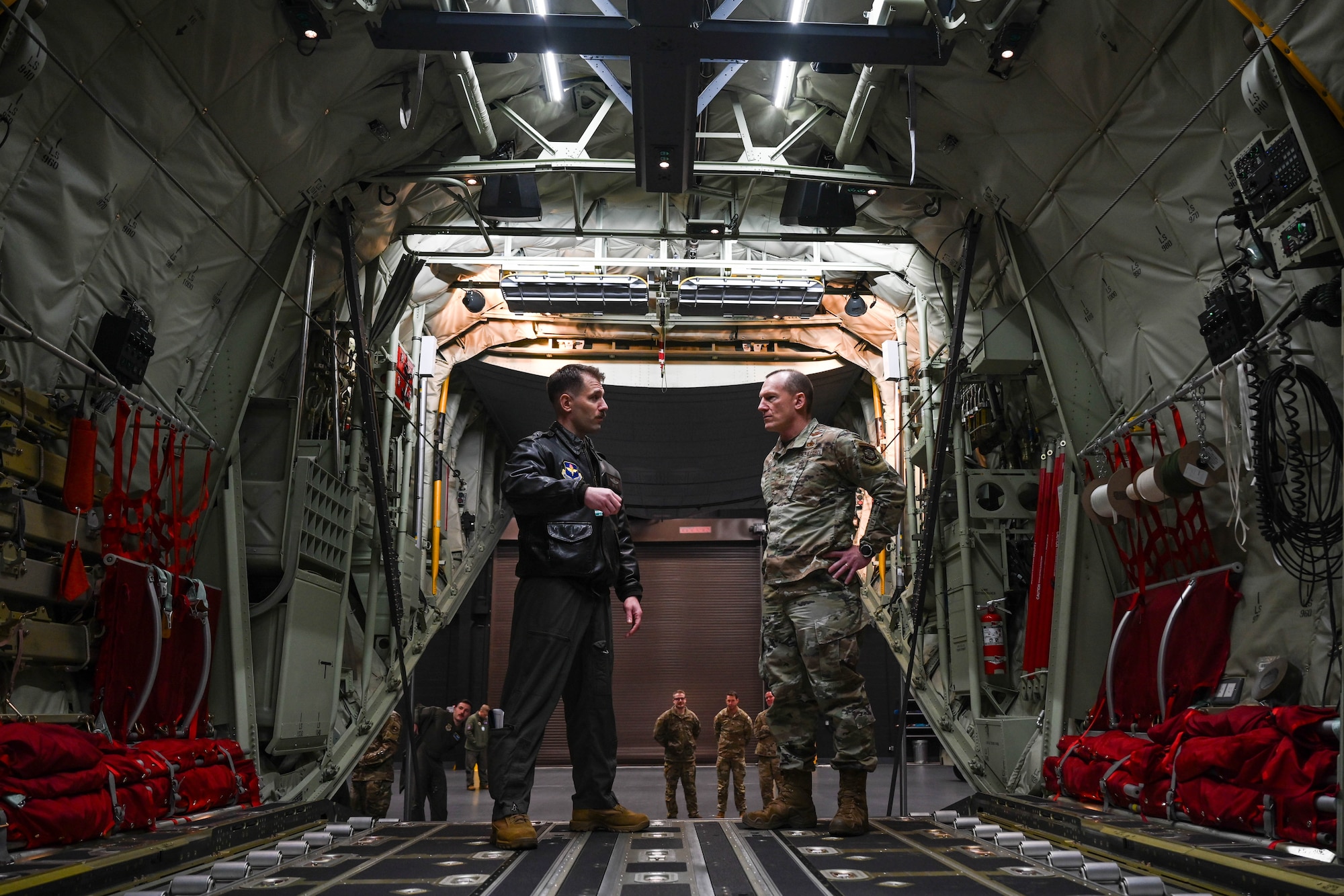 A service member conducts a brief.