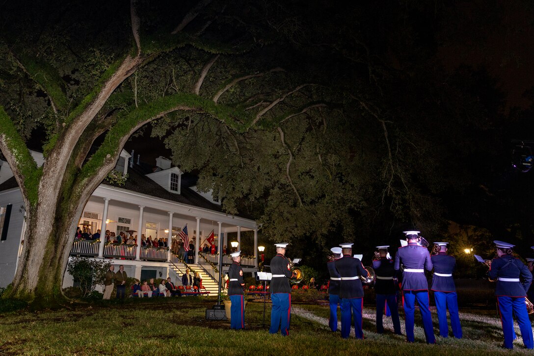 The Marine Forces Reserve Band performs for guests during the Christmas party hosted by Lt. Gen Leonard F. Anderson IV, commander of Marine Forces Reserve and Marine Forces South, at Quarters A in New Orleans, Dec. 6, 2025. The event supported the Marine Corps Reserve Toys for Tots program, with attendees contributing donations throughout the evening. (U.S. Marine Corps photo by Sgt. Samuel Qin)